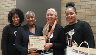 W.I.N.D.O.W., program founder Valerie Goodloe received a certificate of appreciation from D. Sharon Grant Executive Director JTDC Foundation